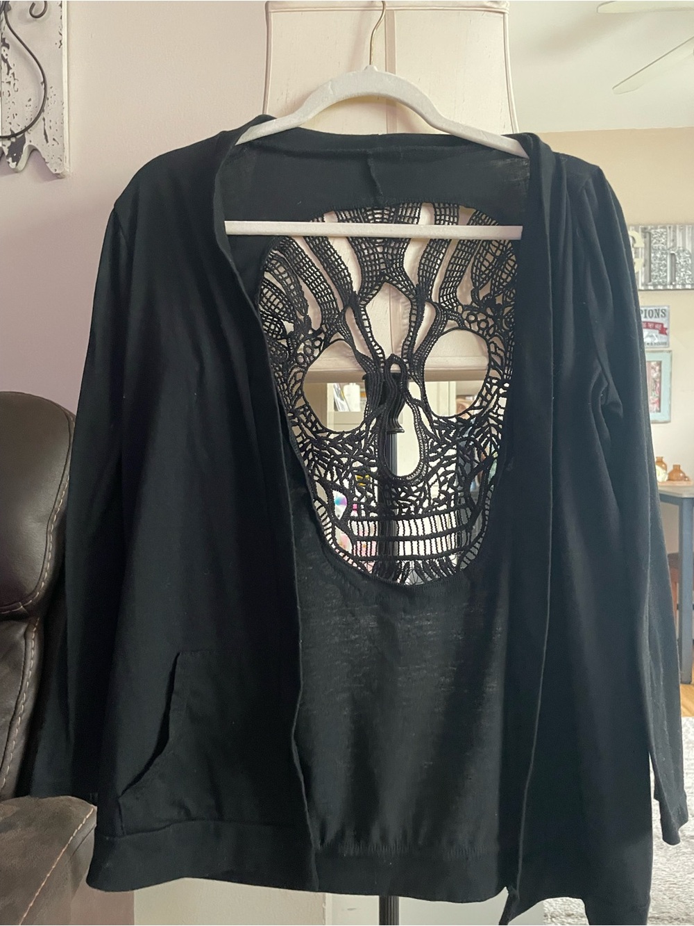 Black Hoodie with Intricate Skull Back Cutout